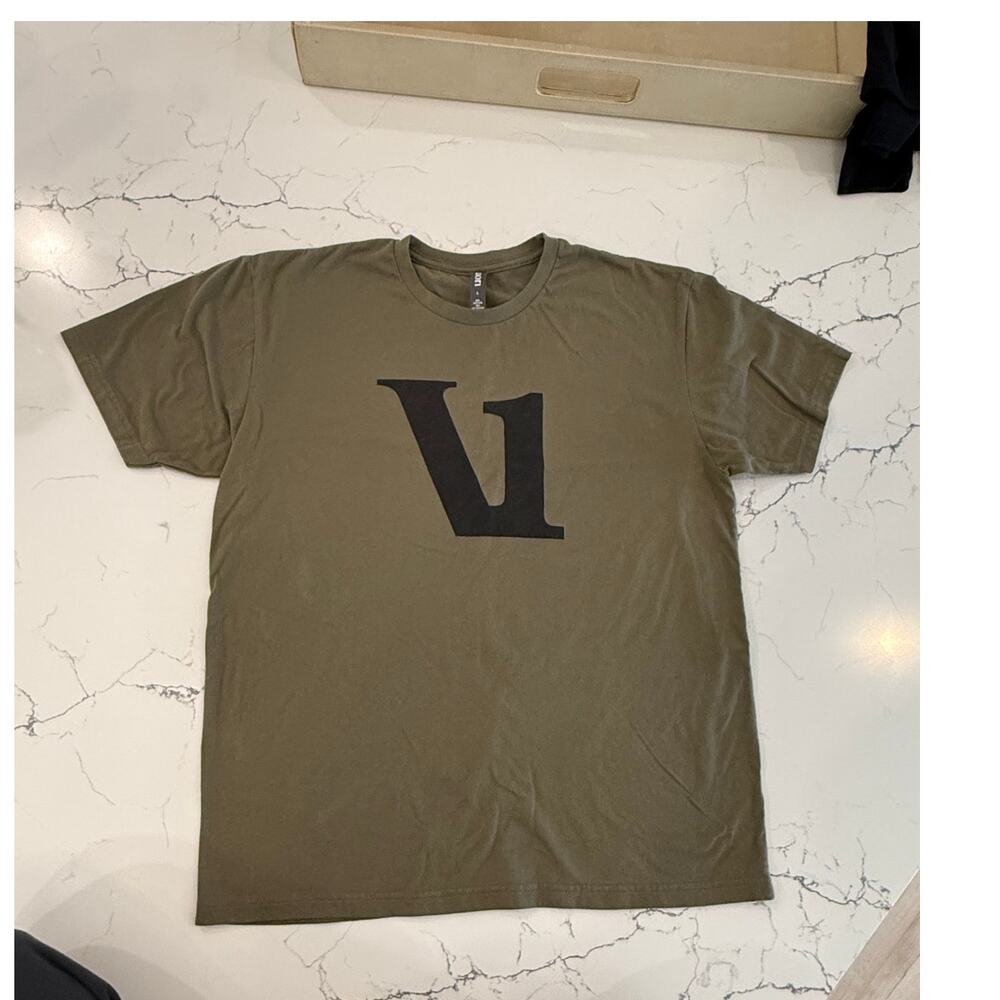 Vuori olive green logo graphic